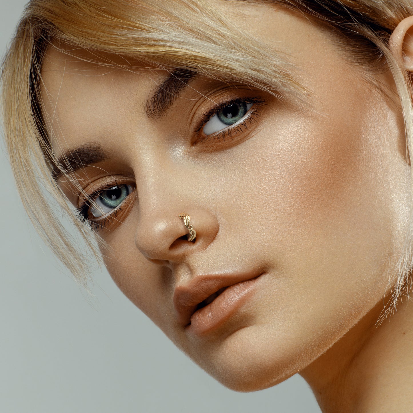 Solid Gold Unique Feather Clicker Hoop
